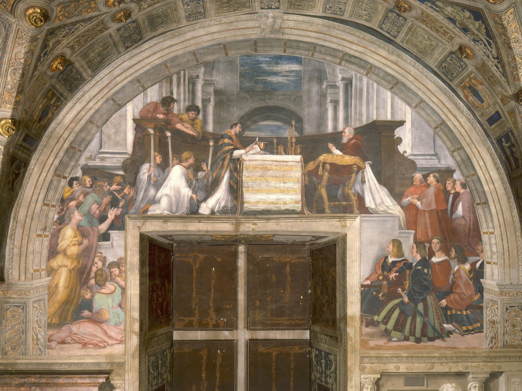 Raphael's Renaissance fresco of the Mass at Bolsena: Pope Julius II kneels at left as a priest at the altar witnesses the consecrated host bleed onto the corporal.