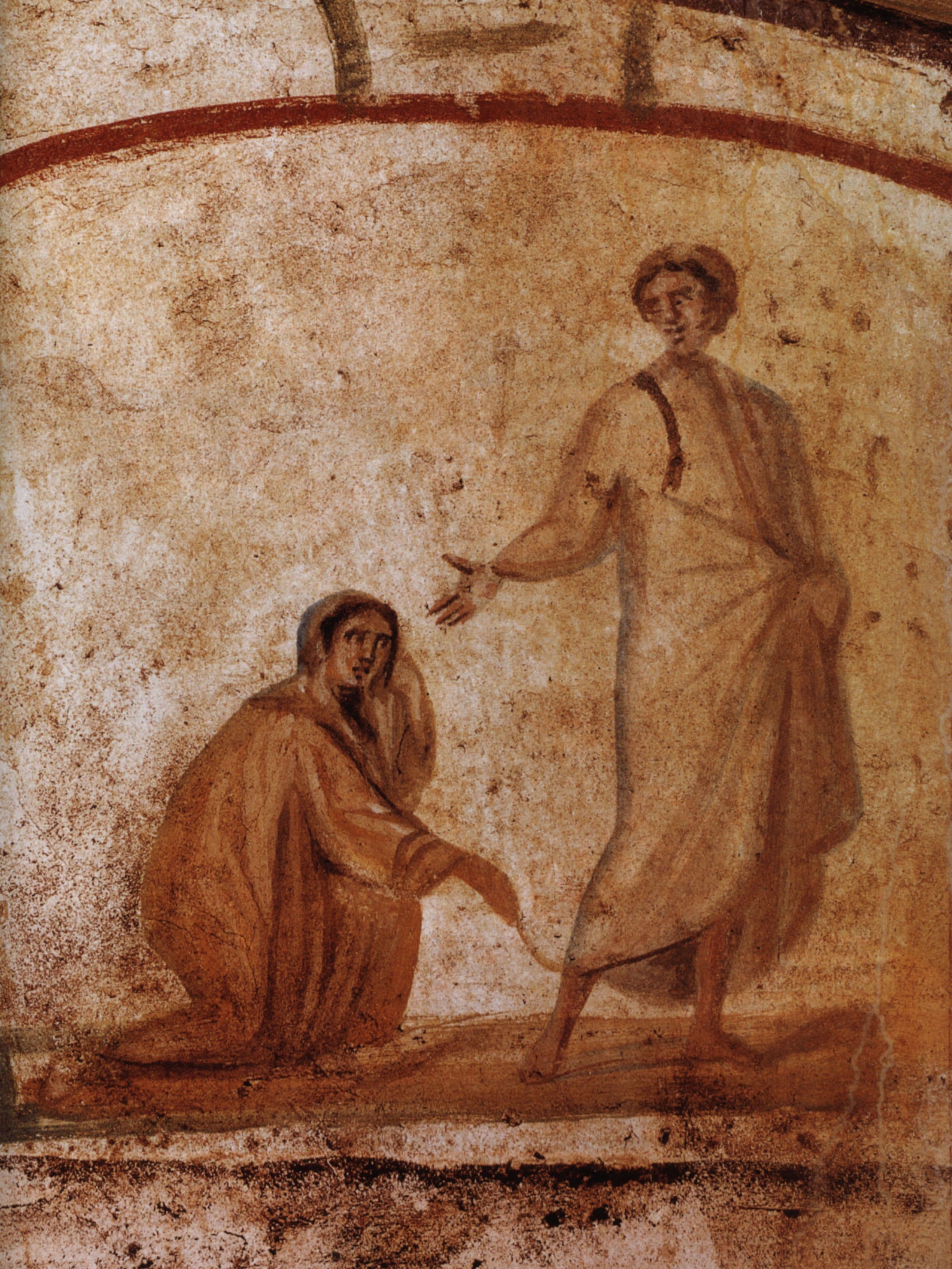 A faded 4th-century catacomb fresco showing a kneeling woman reaching to touch the hem of Christ's robe (the healing of the woman with the issue of blood).