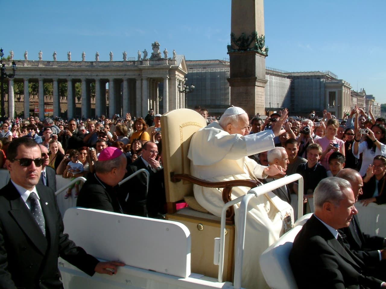 An elderly Pope John Paul II seated at a papal audience on 29 September 2004, in his final months of Parkinson's disease