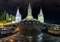 Basilica of Our Lady of the Rosary at the Sanctuary of Lourdes seen across the esplanade, 2018